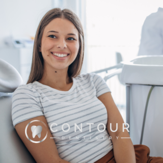 Woman Smiling In Dental Chair
